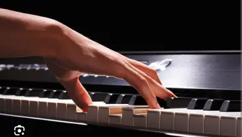 Пианист/тка